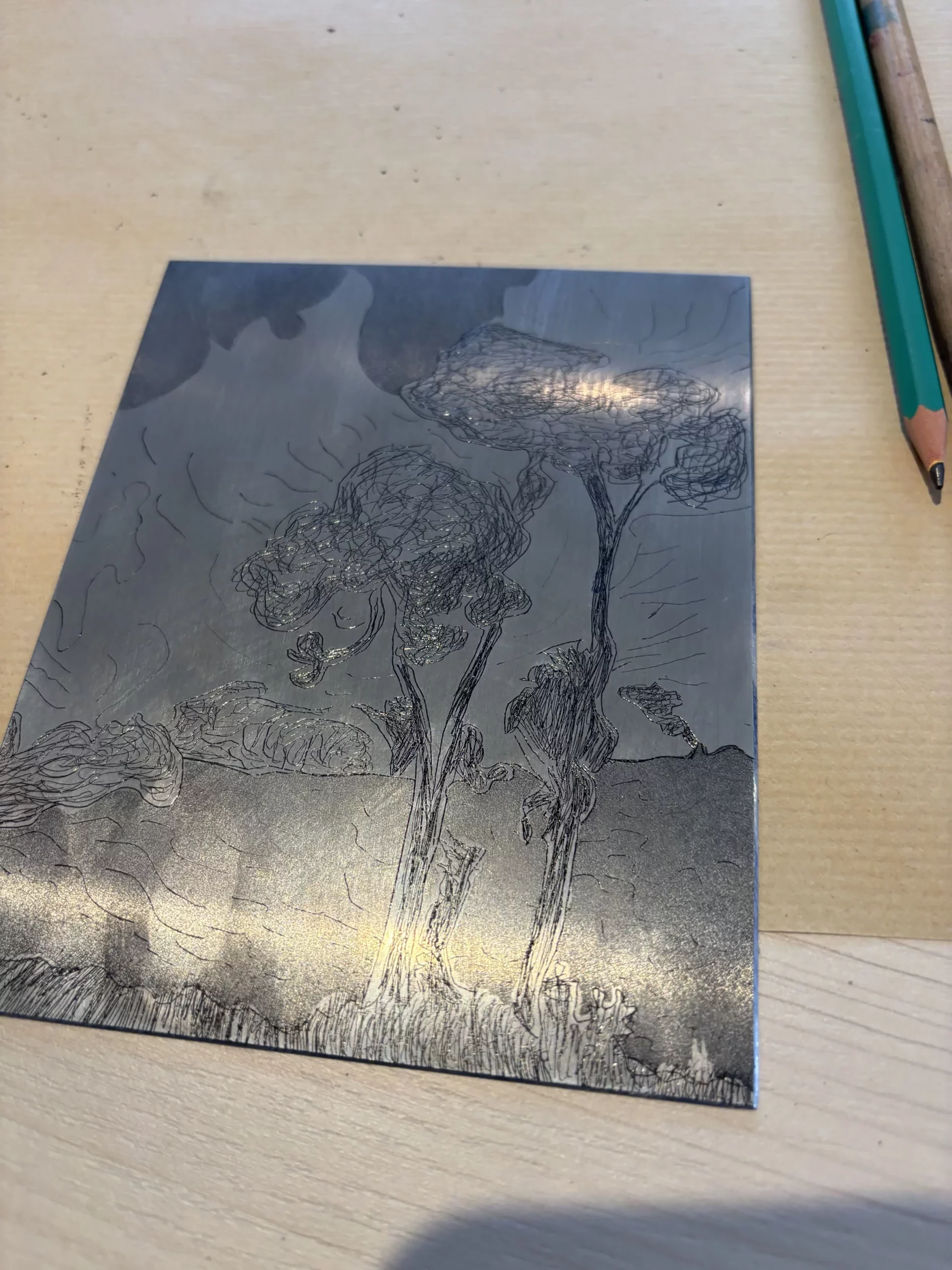 Gravure dans la plaque de zinc