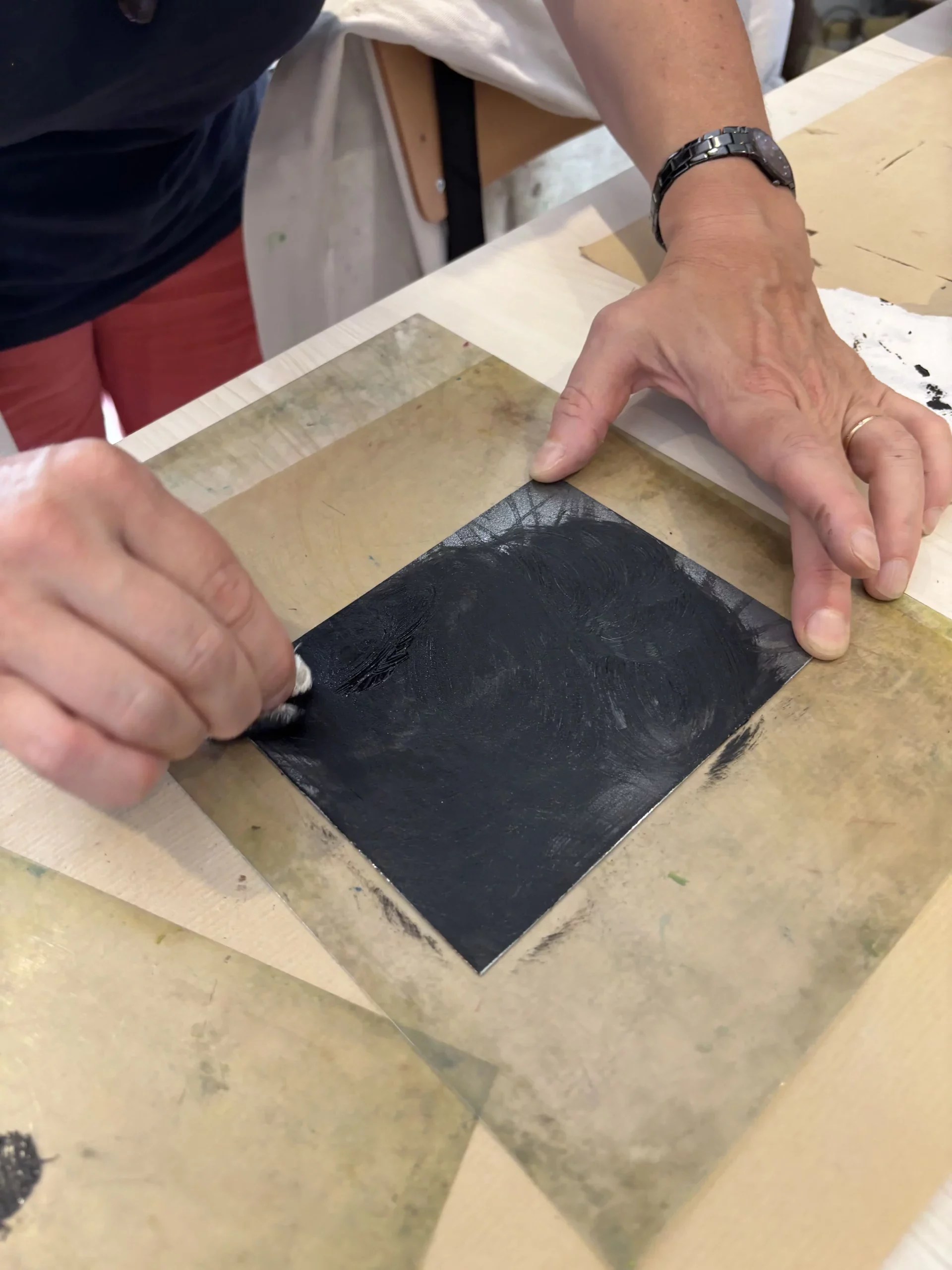 Encrage et essuyage de la plaque